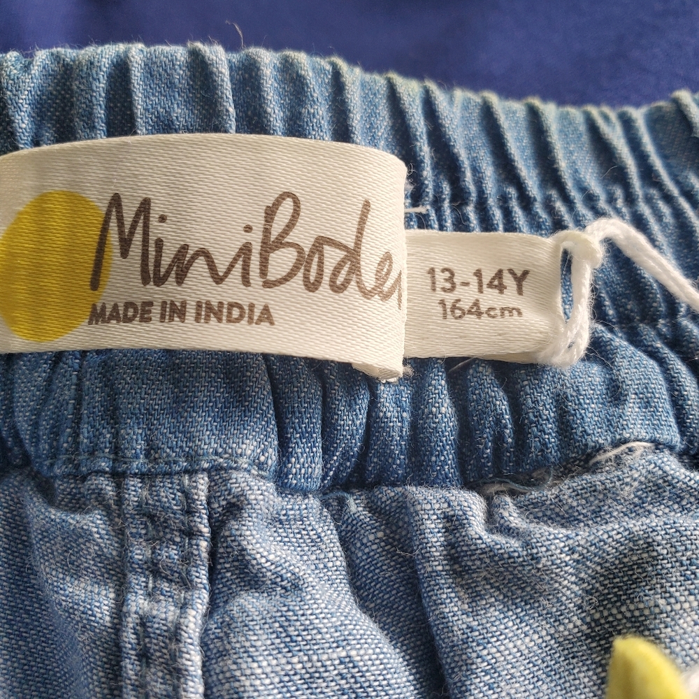 Mini Boden Youth Size 13-14 tiered ruffle denim skort with colorful trim - Picture 3 of 10